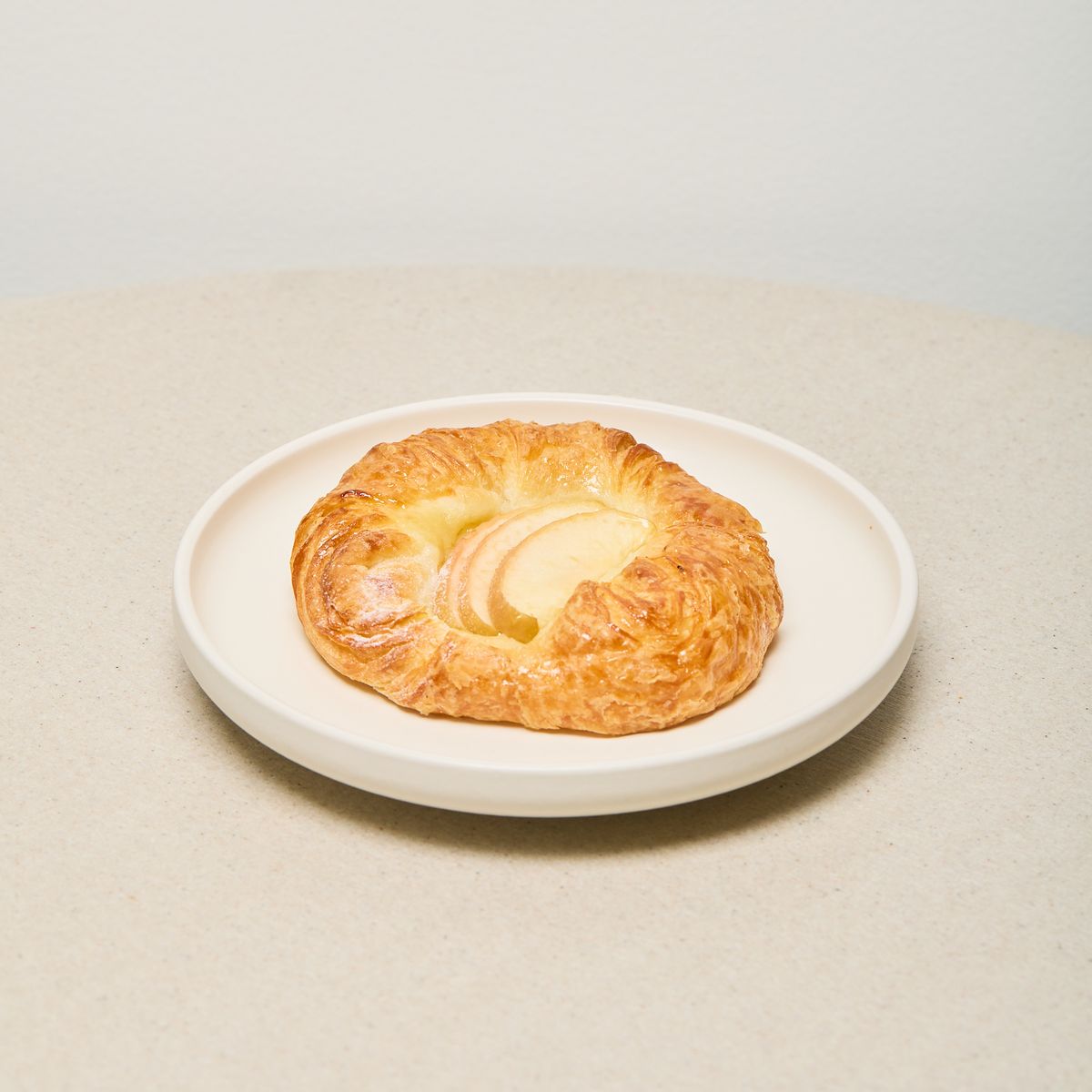 Honeycrisp apple danish on a white plate