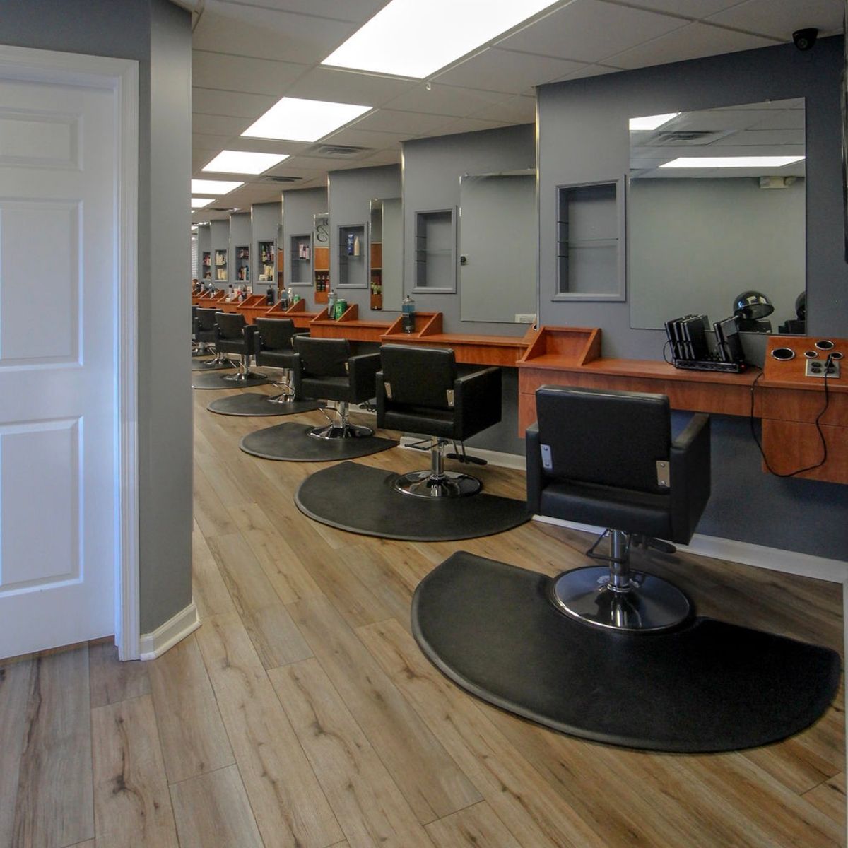 Row of styling stations inside Shear Serenity salon